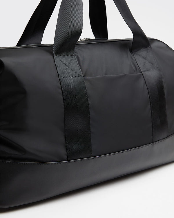 バッグ HK89 EYELETS NYLON BAG (BLACK) 3167B Kelowna 2.0 Recycled Nylon Weekender Bag - WANT Les Essentiels