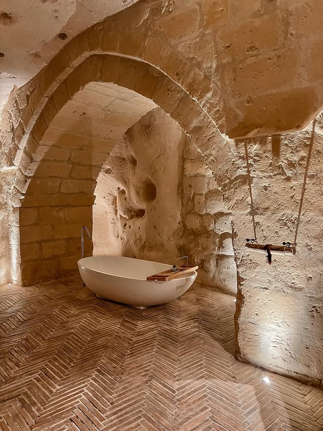 Close up of a bathroom at a luxury hotel of Matera, installed in neolithic caves.