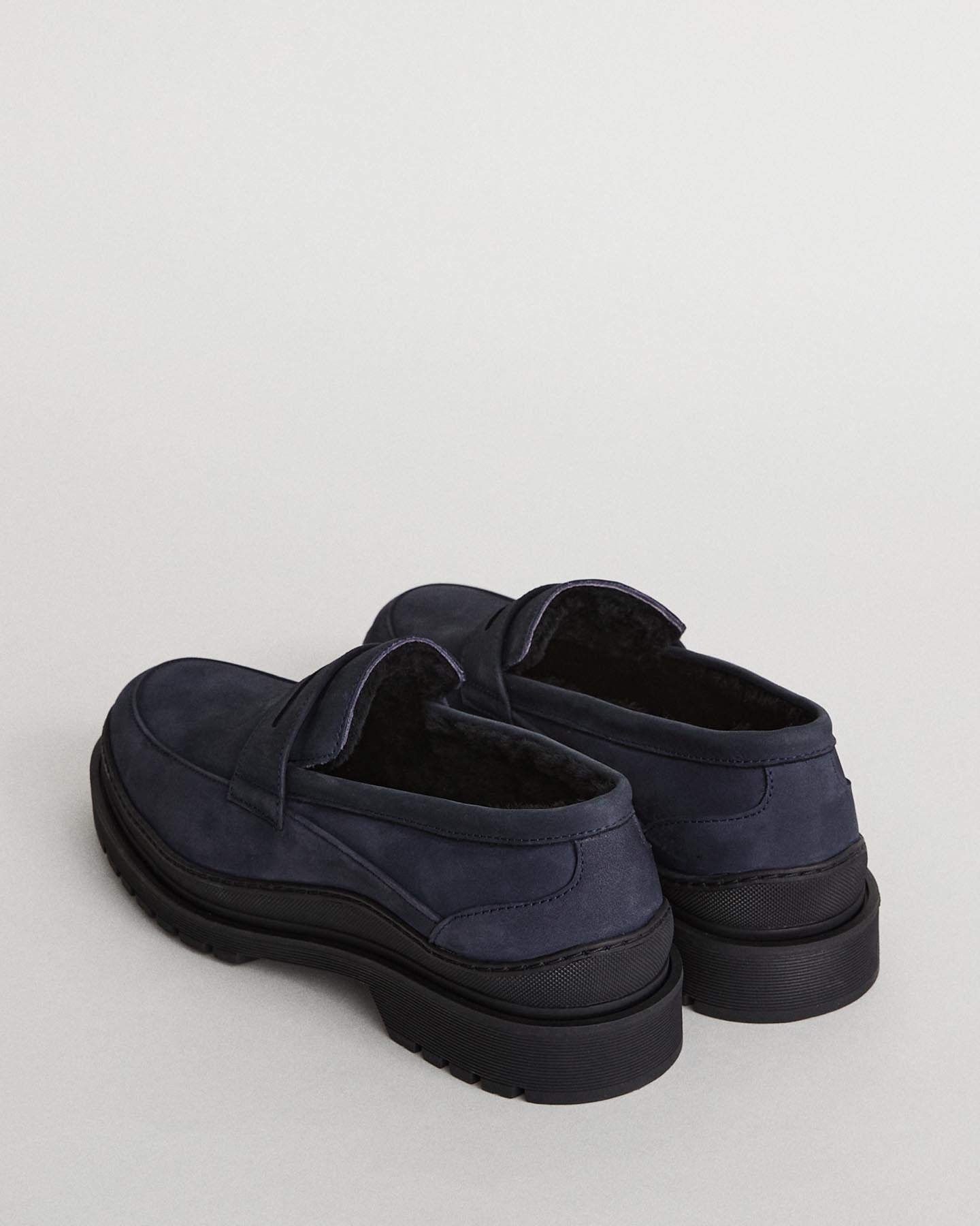 Mocassins en peau de mouton à crampons Graves